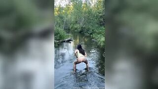 BushyBunnie - Pissing downstream in the pretty river!...