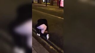Drunk blonde falls down trying to piss
