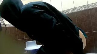 two girls- one of them pees