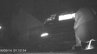 Two desperate girls peeing in a hidden spot of a Chinese night market under the guidance of a staff member