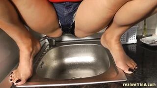 Erica - Erica Pees Her Jeans Shorts Over The Sink