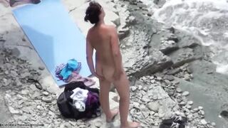 she is peeing in the water near the beach