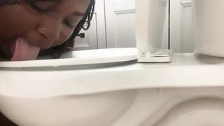 Toilet licking slut, with little poop droplets dropping out of her